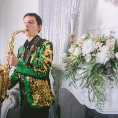 Саксофонист Александр Мустафин